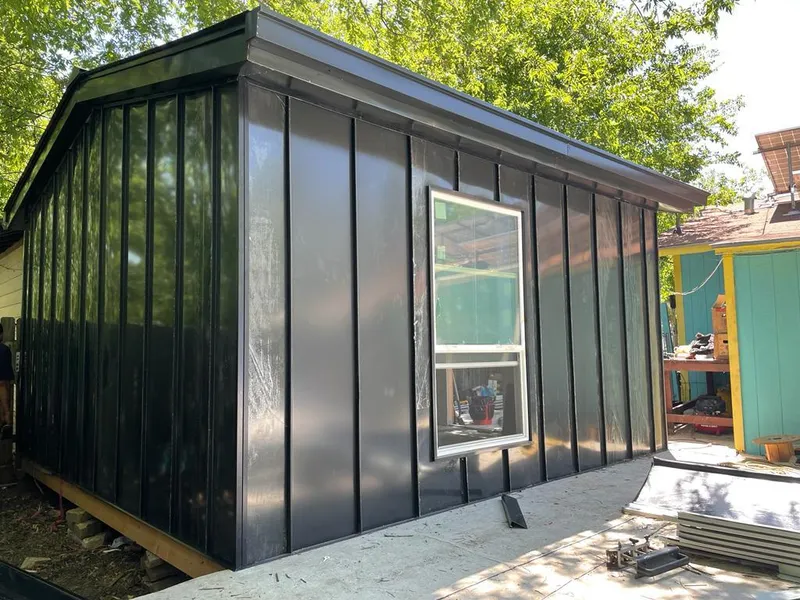 Black standing seam metal wall panels for Metal Roof Installation in Lake Monticello
